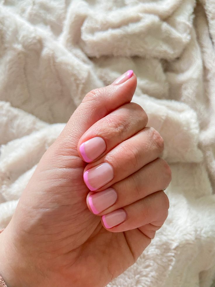 Chic Modern French Manicure: Soft Nude Base with Playful Pink Tips