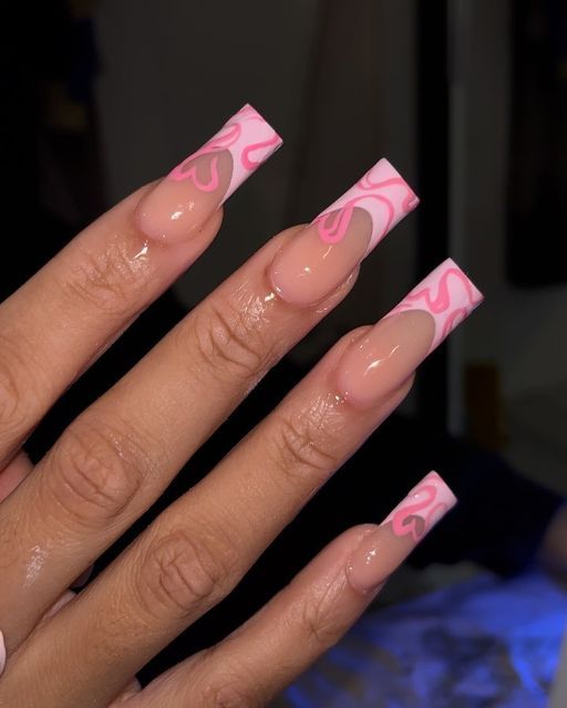 Vibrant Long Square Nail Design with Pink Swirls and Hearts for a Fun, Romantic Look.