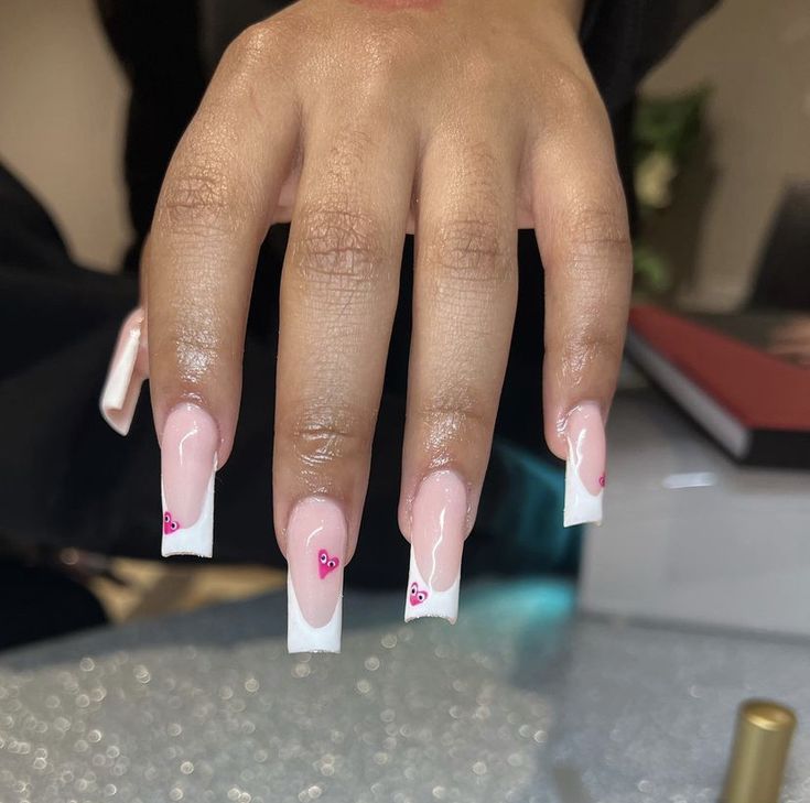 Chic Long Square Nail Design with Blush Base and Heart Accents