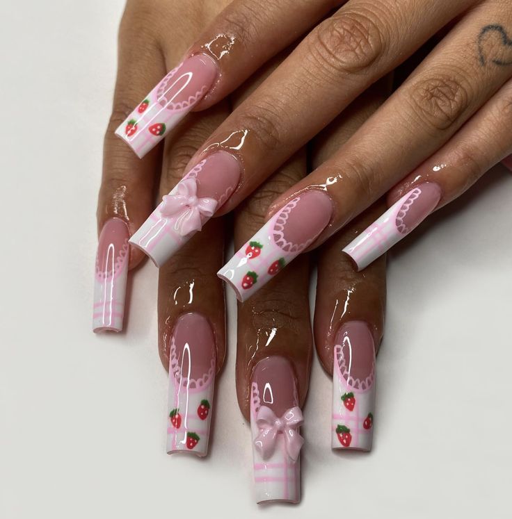 Charming Nail Art: Playful Patterns on Long Square Tips with Soft Pink and Strawberry Accents