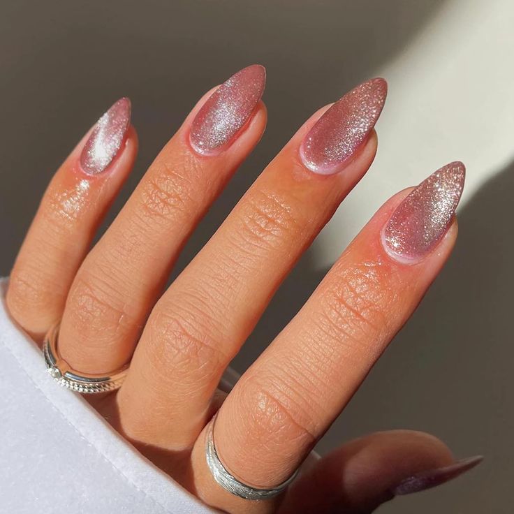 Elegant Shimmery Pink and Silver Gradient Stiletto Nails.