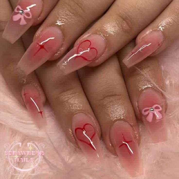 Romantic Nail Design with Elegant Pink Hues and Charming Heart Shapes