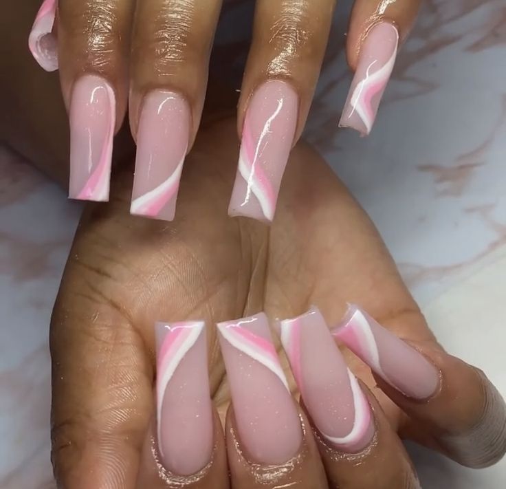 Chic Long Square Nails with Soft Pink Base and Elegant Swirl Design.