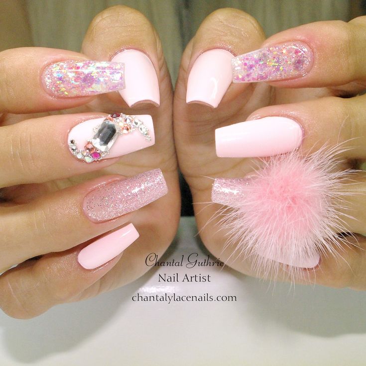 Elegant Soft Pink Nail Design with Glossy and Glitter Finishes, Featuring Playful 3D Elements.