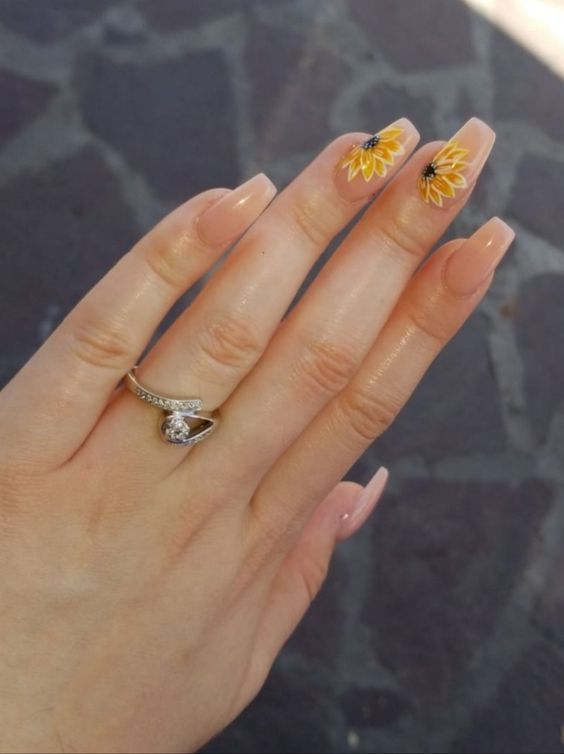 Vibrant Sunflower Floral Nail Design: Cheerful Elegance with a Subtle Shine