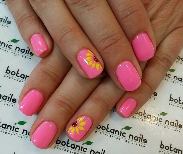 Cheerful Pink Floral Nail Design for a Playful Summer Vibe.