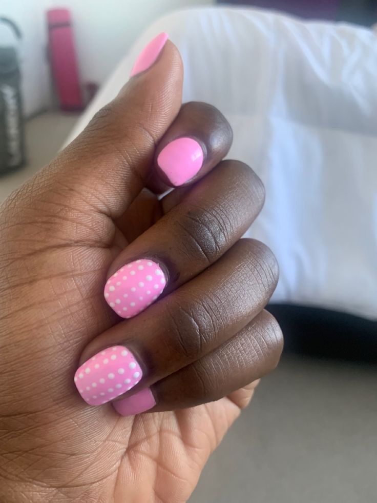 Playful Pink Polka Dot Nail Art for a Cheerful Look