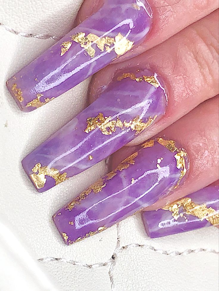 Luxurious Purple Marble Nails with Gold Foil Accents