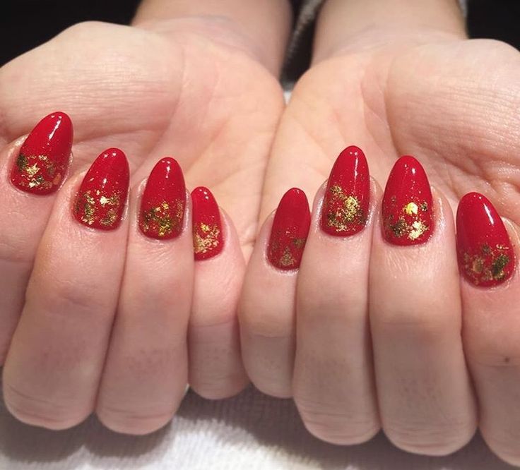 Elegant Red and Gold Nail Design with Striking Contrast for Festive Glamour.