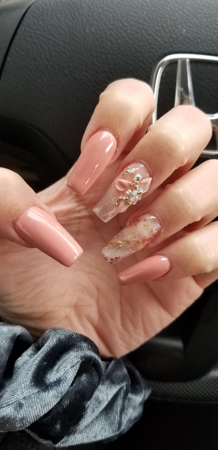 Chic Elegant Nail Design: Soft Pink with Intricate Floral and Gold Accents