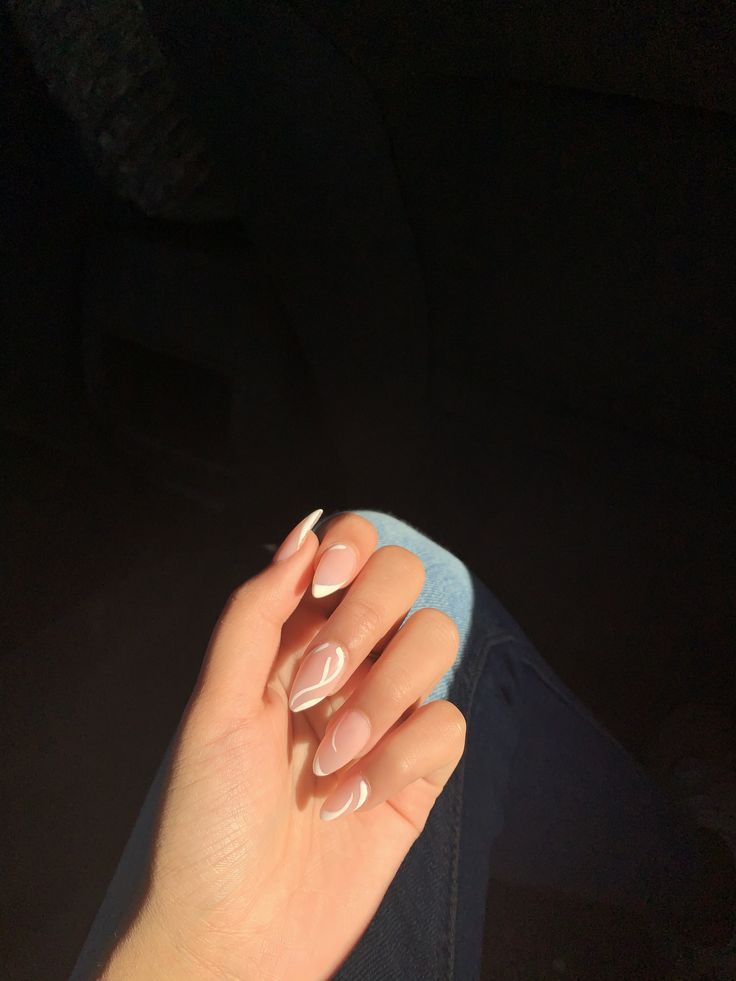 Chic Elegant Almond-Shaped French Tip Manicure with Nude Base.