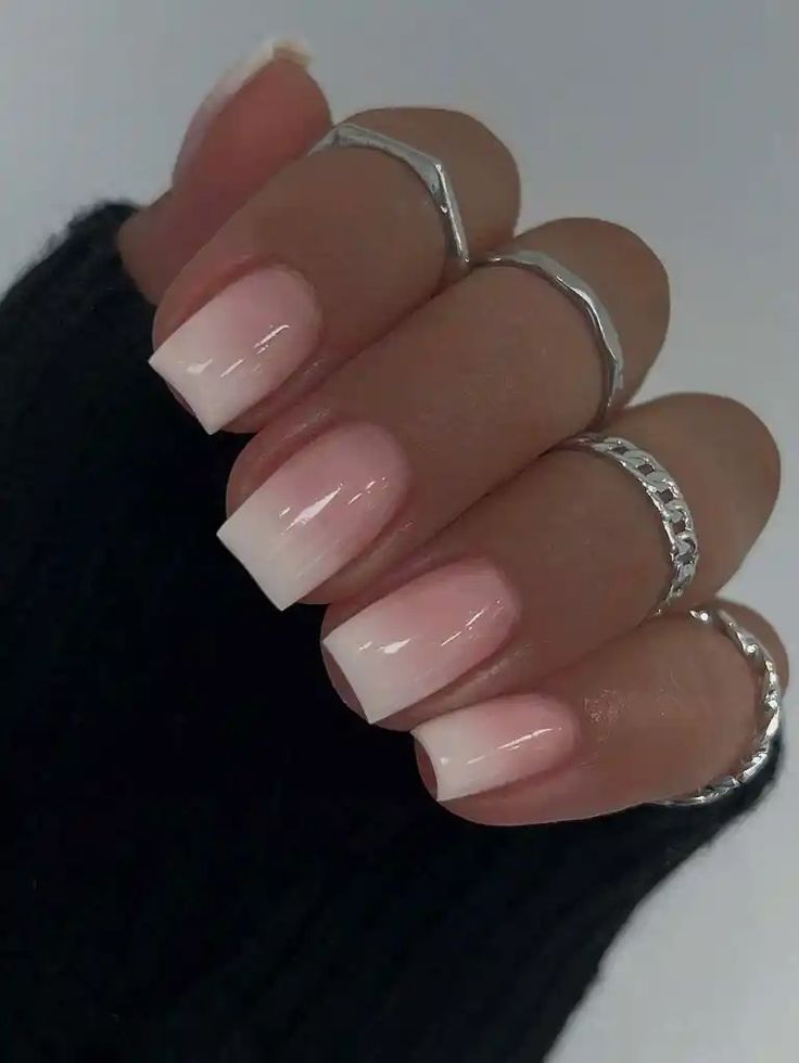 Chic Ombre Nails: A Stylish Gradient from Soft Pink to White with Elegance.