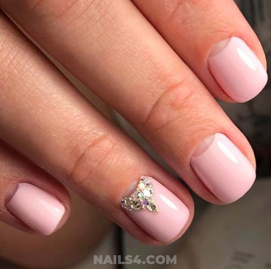 Glamorous Elegant Pink Nail Design with Heart-Shaped Rhinestone Accent