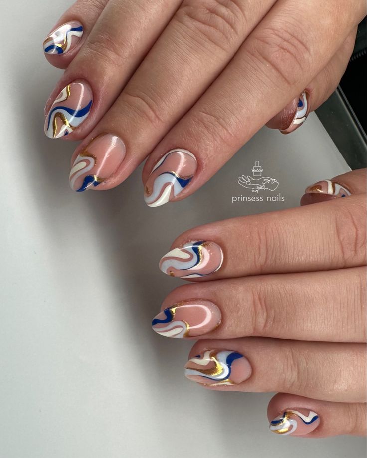 Sophisticated Swirling Nail Art in White, Blue, and Gold on a Soft Nude Base.