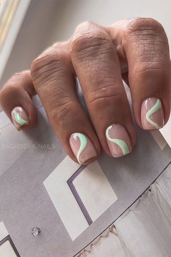 Chic Pastel Nail Design: Elegant Mint Curves on a Nude Base