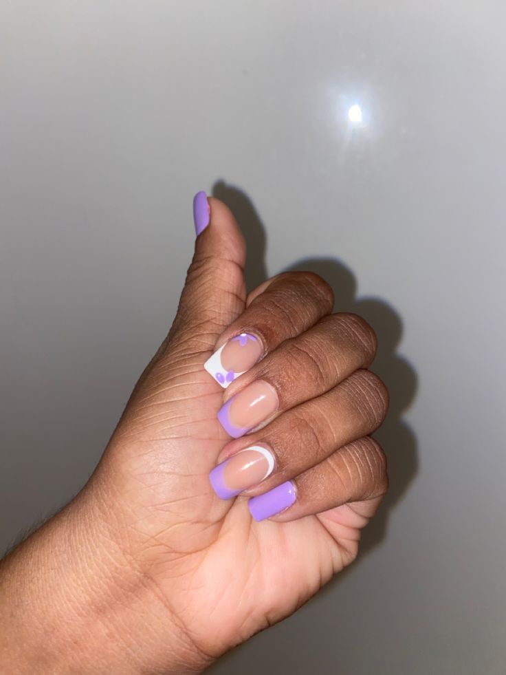 Chic Lavender and Nude Nail Design with Elegant Half-Moon Accent.