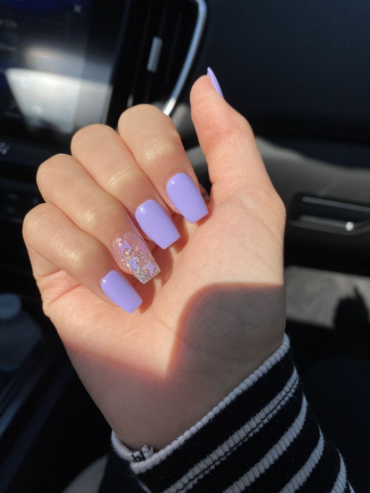 Elegant Lavender Nail Design with Glossy Finish and Sparkling Accent.