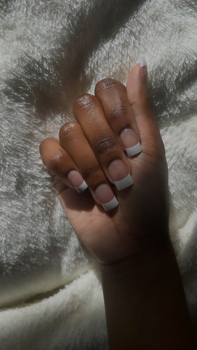 Chic French Manicure: Natural Pink Base with Classic White Tips for Versatile Elegance.