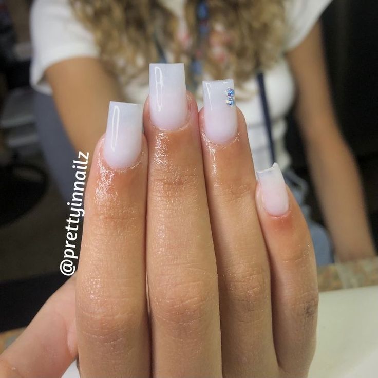 Chic Ombre Nails: Soft Pink to White Gradient with Sparkling Rhinestone Accent