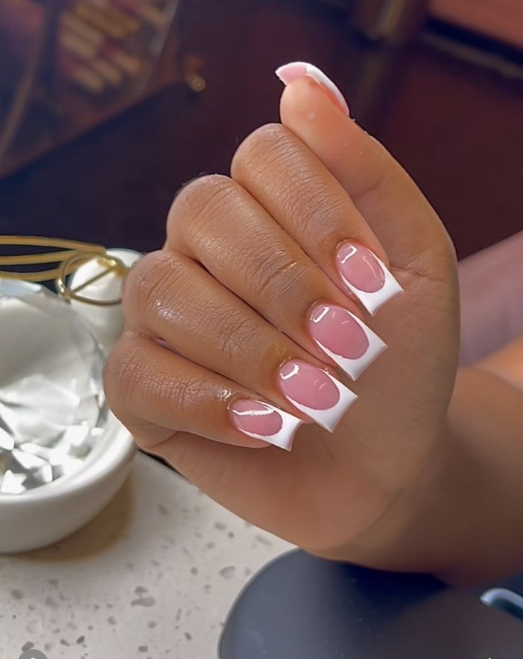 Sophisticated Nail Design: Classic French Tips with a Modern Twist