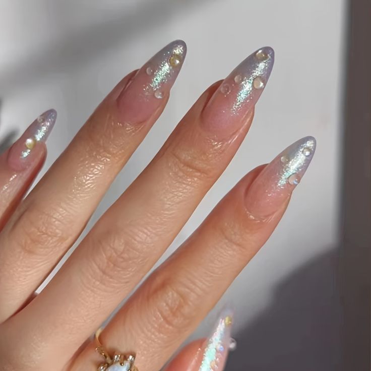 Elegant Ombre Stiletto Nails with Iridescent Glitter and Pearls