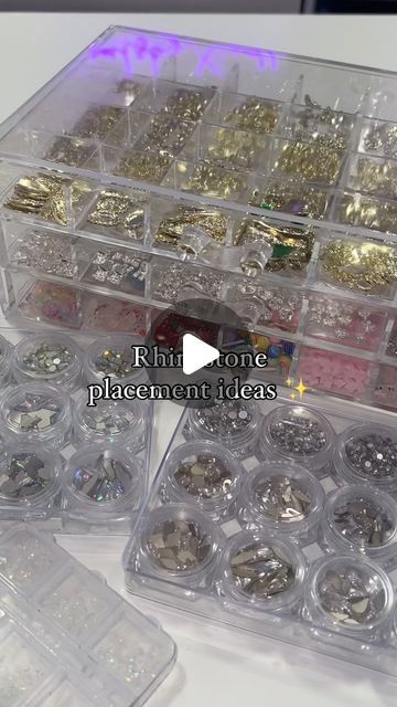 Organized Rhinestone Display: Sparkling Nail Art Inspirations in Various Shapes and Sizes.