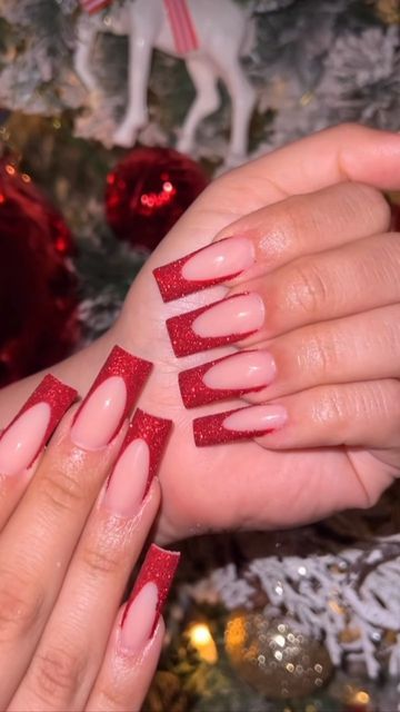 Glamorous Red Glitter Tip Nail Design with a Soft Nude Base