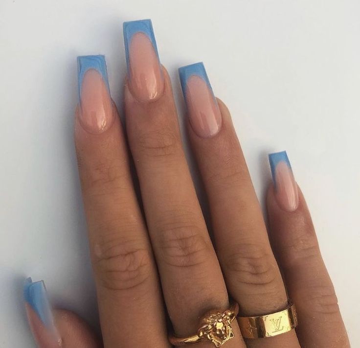 Elegant Ombre Nail Design with Soft Blue Tips on Long Square Nails.