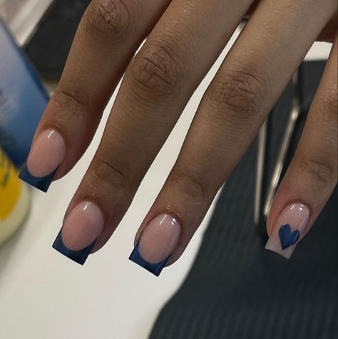 Chic Nail Art: Nude and Deep Blue with Geometric Tips and Heart Accents.