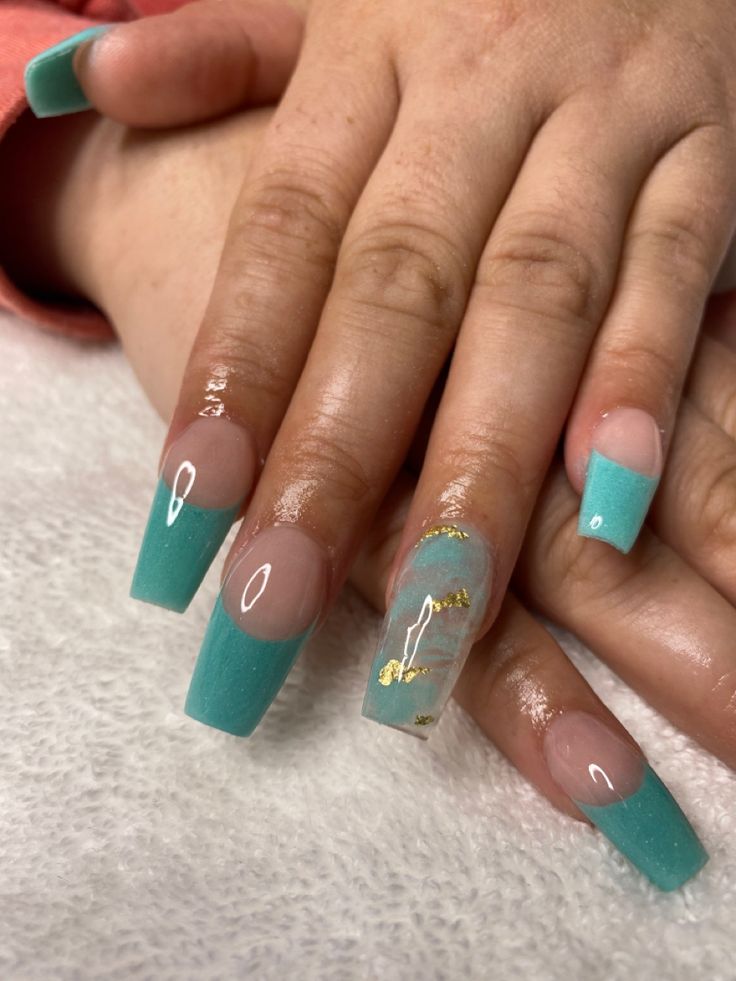 Chic Turquoise Nail Design with Translucent Accents and Gold Foil