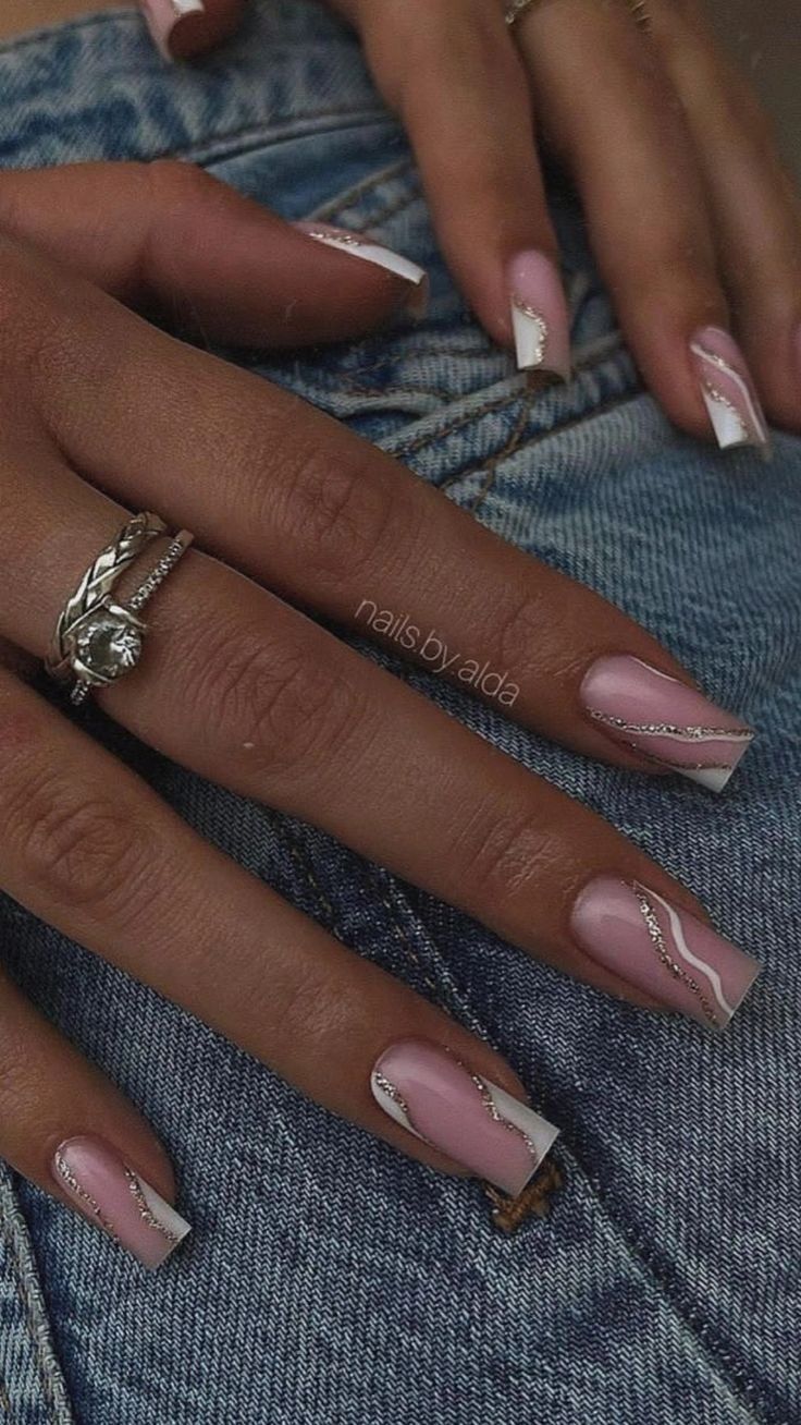 Chic Elegant Pink and White Nail Design with Sophisticated Silver Stripes.