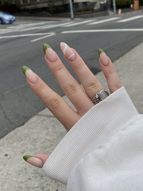 Chic Nail Design Fusing Natural Tones with Vibrant Green Tips for a Stylish Statement.