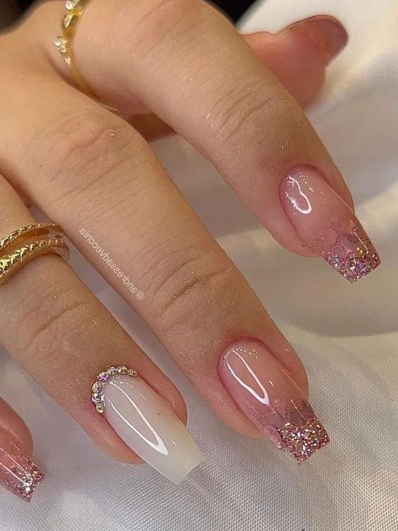 Sophisticated Gradient Nail Design with Sparkling Accents and Jewel Detail