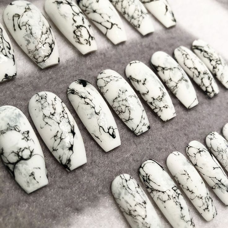 Chic Monochrome Marble-Inspired Nail Design for a Sophisticated Look