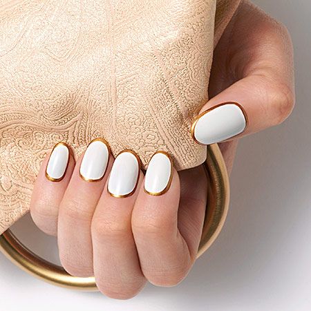 Chic White Nails with Gold Tips: A Modern Elegance Statement.