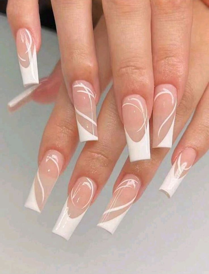 Elegant Long Square Nail Design with Glossy Clear Base and Delicate White Swirls.