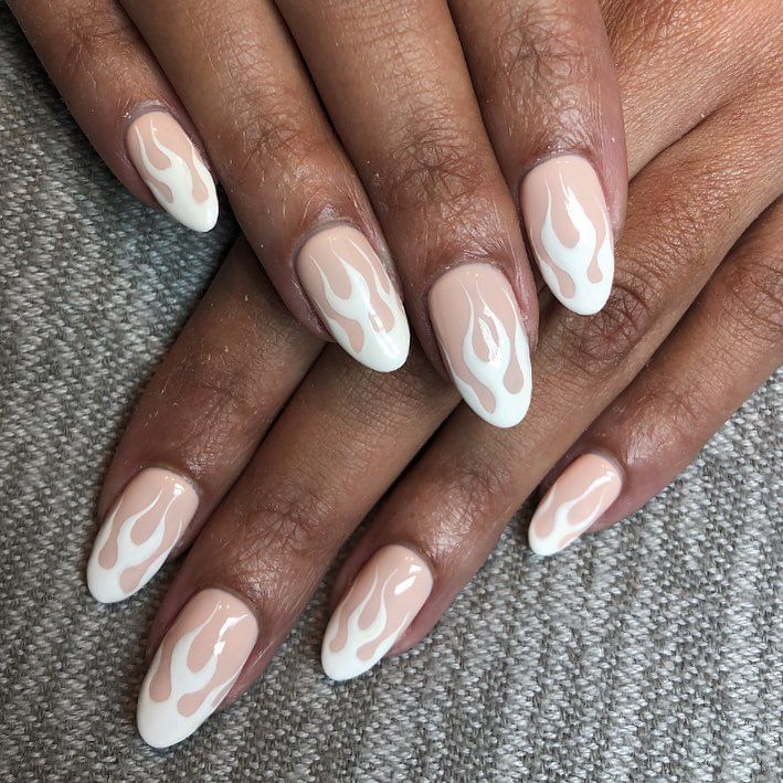 Edgy Chic: Flame-Inspired Nude and Bold White Nail Design