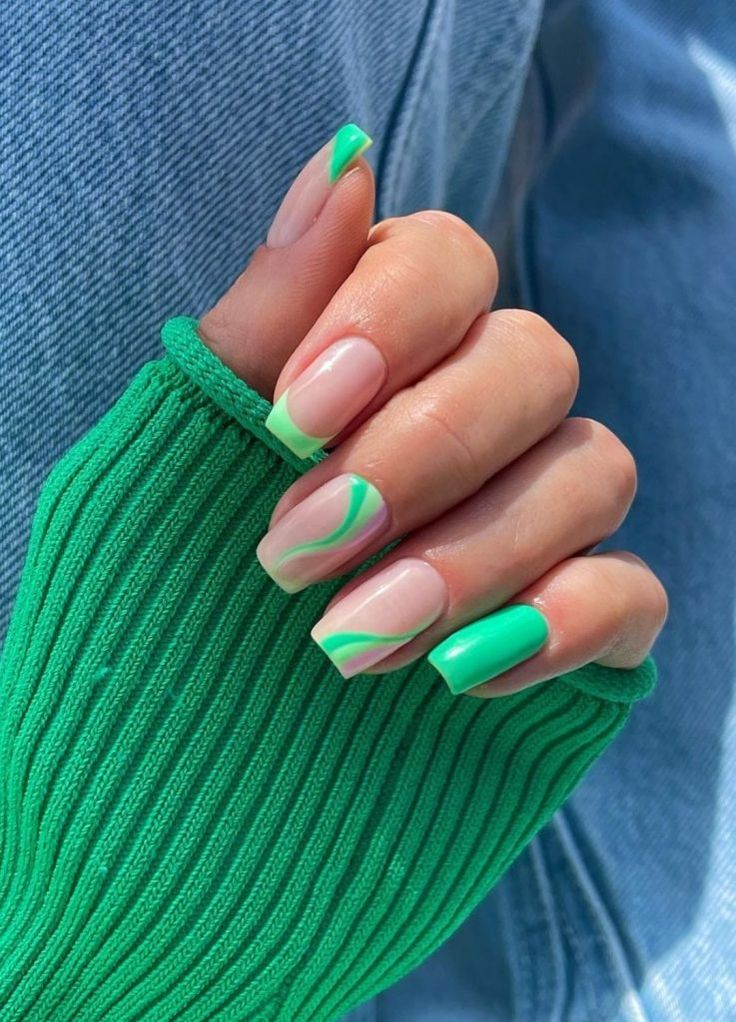 Playful Vibrant Green Nail Design with Solid Tips and Delicate Swirls for Spring/Summer.