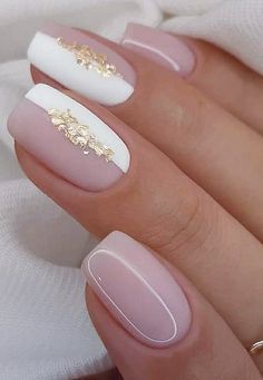 Chic Elegant Nail Design with Soft Pink Base, Glossy White Accents, and Gold Flakes.