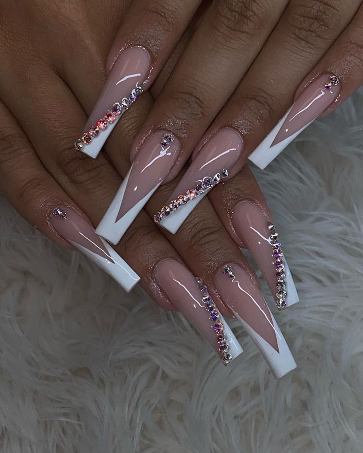 Luxurious Long Tapered Nail Design in Nude and White with Rhinestone Accents