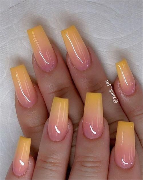 Chic Ombre Nail Design: Elegant Peach to Yellow Gradient with Glossy Finish.